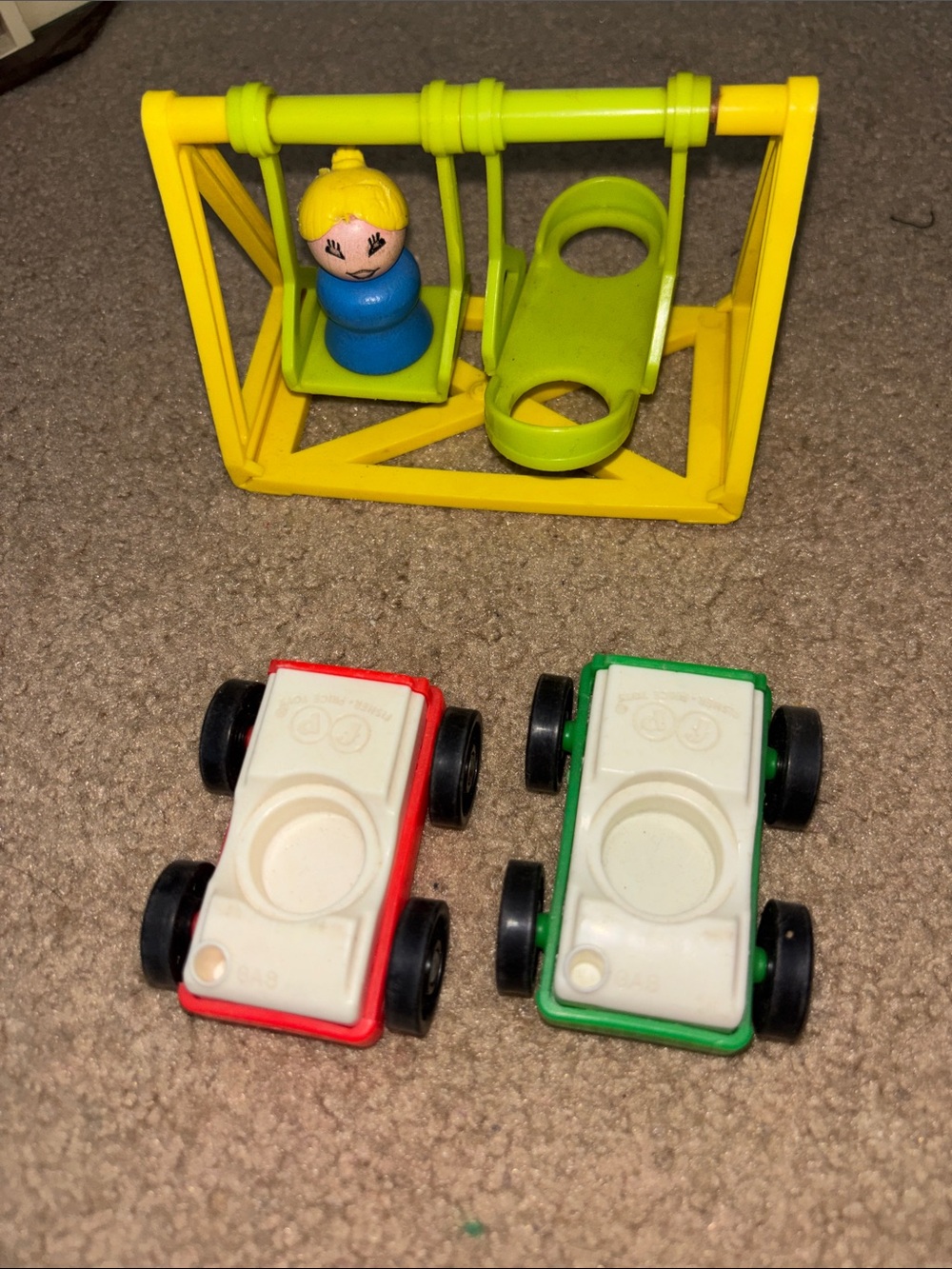 Fisher-Price Yellow Swing with Blue Peg Doll and Red & Green Mini Cars